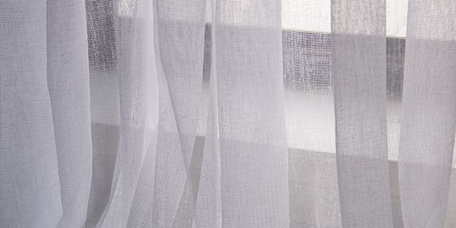 Rénovez vos rideaux : astuces pour les blanchir naturellement