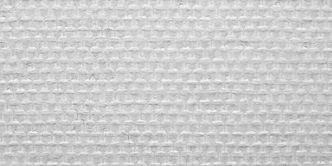 Toile de verre : l'alliée insoupçonnée de la rénovation intérieure